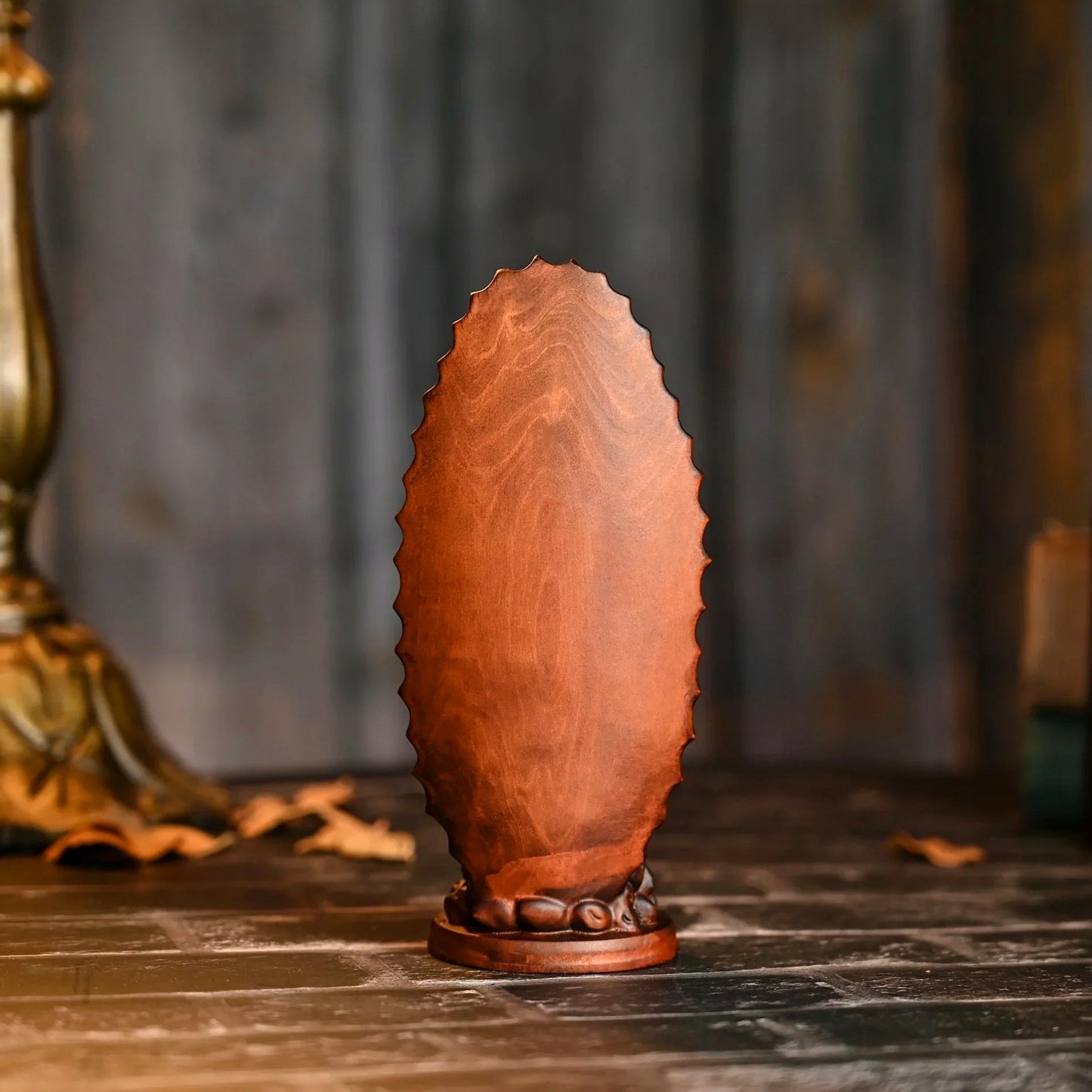 The back of the carving — solid wood, no mold seams, vintage finish