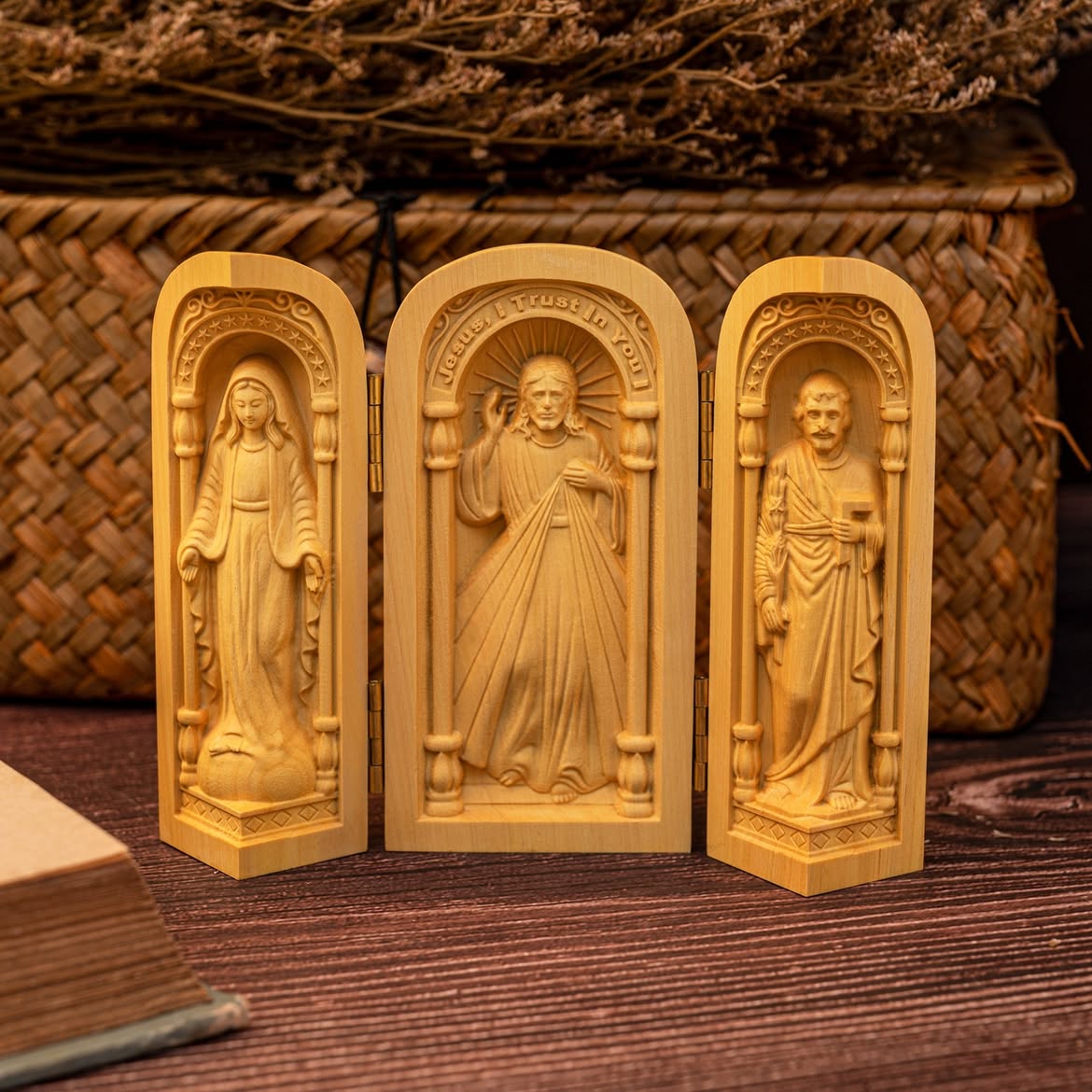 Three travel triptych altars displayed together
