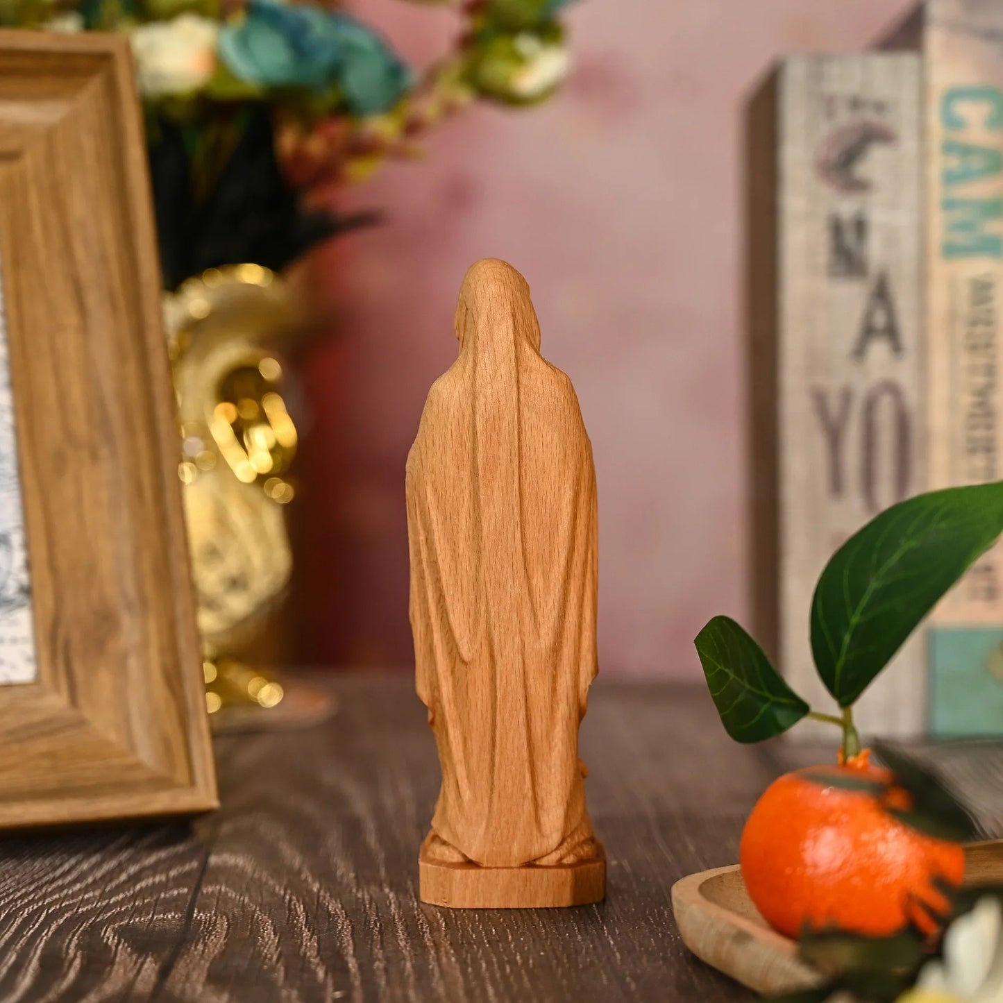 The back of the natural beech Our Lady of Lourdes carving