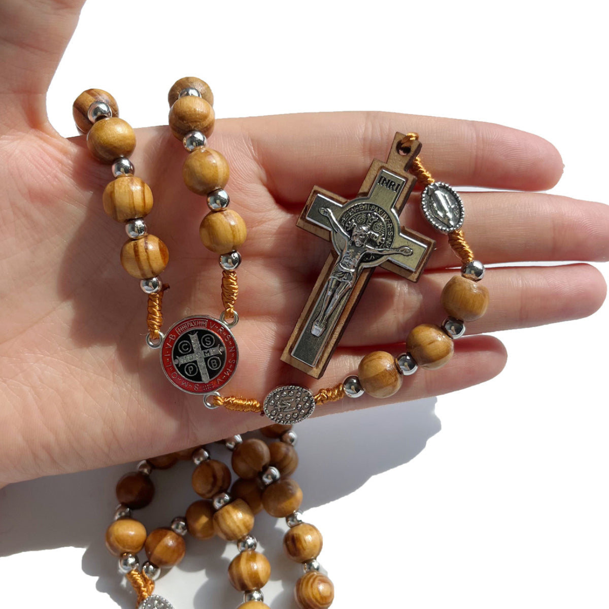 St. Benedict rosary held in an open palm
