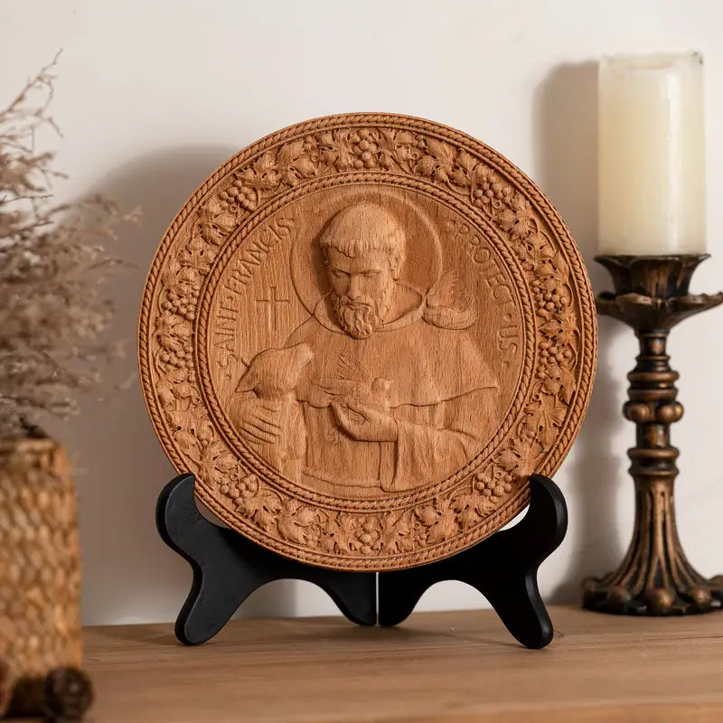 The natural beech St. Francis Medallion on a display stand