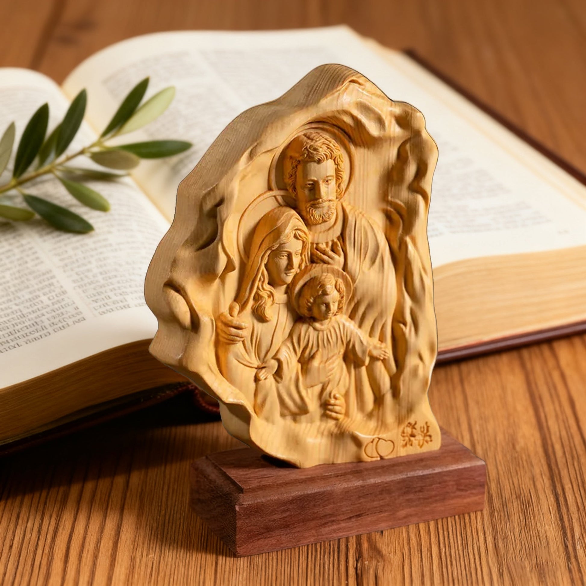 The boxwood Holy Family relief on an open bible
