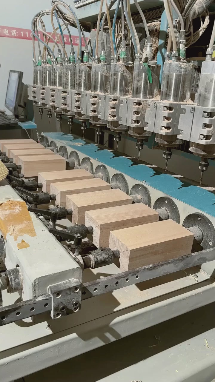 The carving: solid wood cut by precision machine, then detailed with hand tools